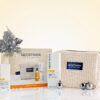 NEOSTRATA Brightening Gift Set with skincare products, beauty bag and silver Christmas decorations