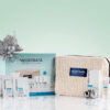NEOSTRATA Restore Gift Set with skincare products, beauty bag and silver Christmas decorations