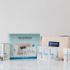 NEOSTRATA Restore Gift Set contents and cream beauty bag with silver baubles