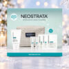 NEOSTRATA Restore Gift Set box against a snowy Christmas background with warm lights and a snowflake