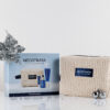 NEOSTRATA Skin Active Gift Set box beside its cream beauty bag and Christmas decorations