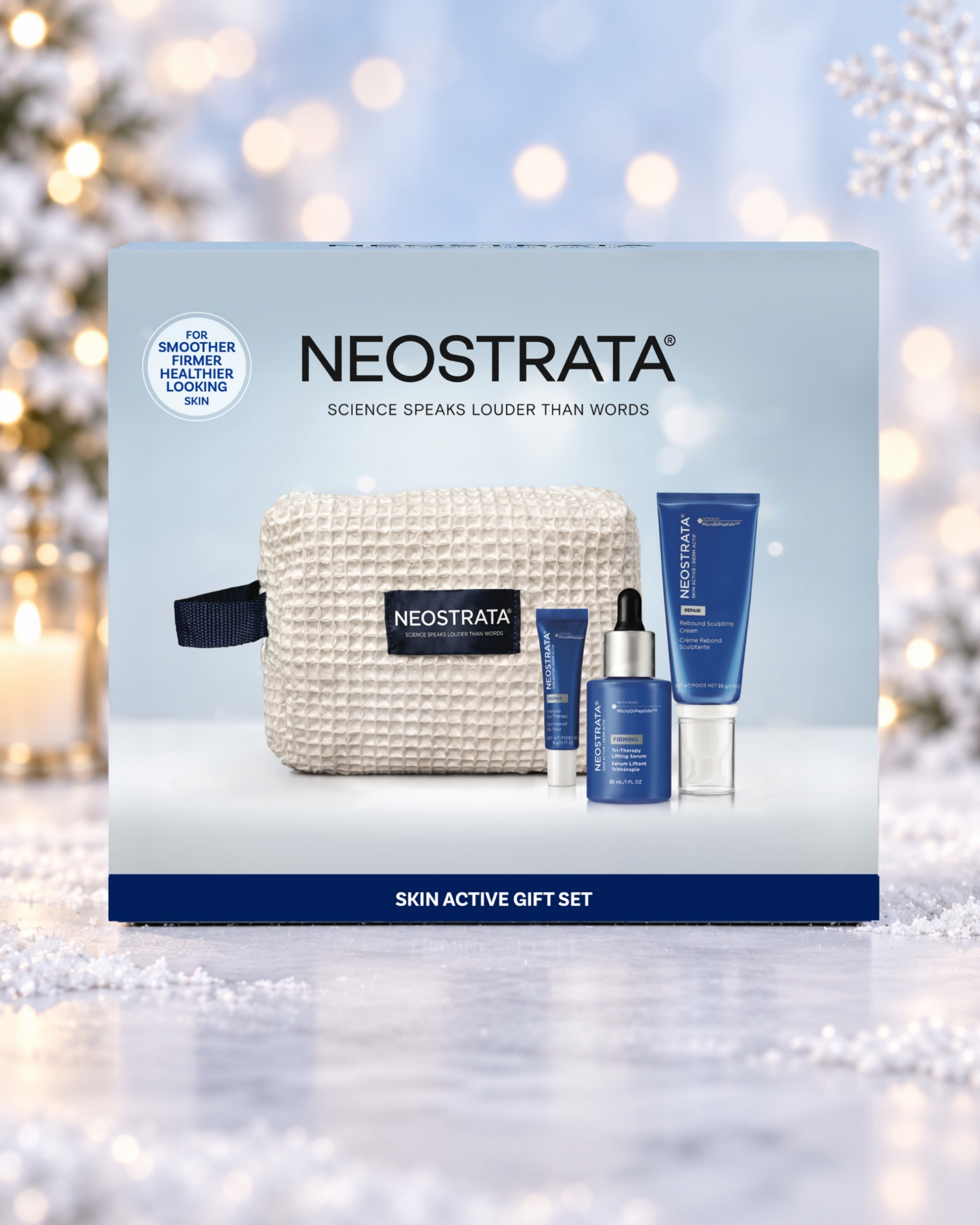 NEOSTRATA Skin Active Gift Set box against a snowy Christmas background with warm lights and a snowflake